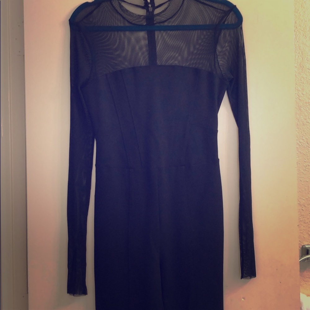Black long sleeve with mesh jump suit.